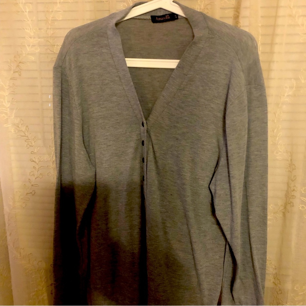 This sweater is in real good shape not heavy
